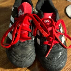 Adidas Black and Red cleats kids size 11
